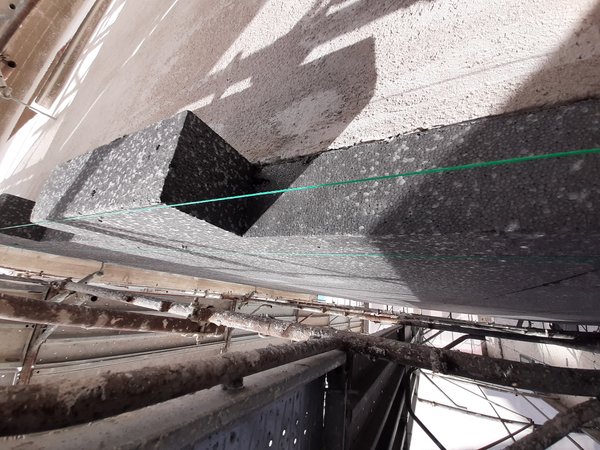 Dettaglio della posa di cappotto