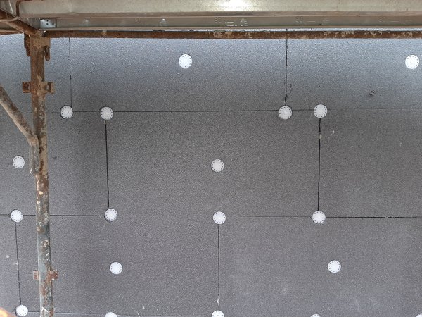 Dettaglio posa del cappotto